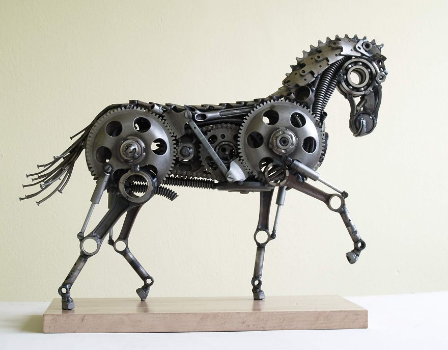 wonderful-sculptures-created-with-recycled-motorbike-parts-15_880.jpg